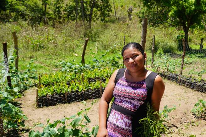 Woman in communal garden in Honduras
