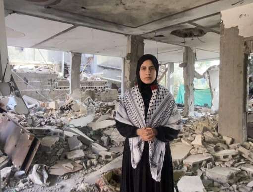 Girl standing in rubble 